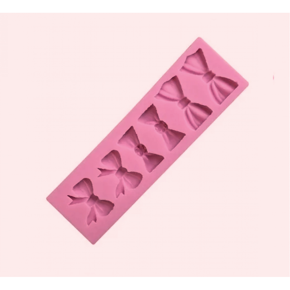 Molde silicona moños x 6 cav